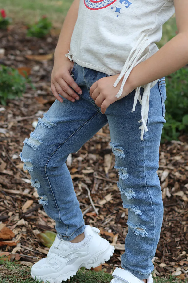 Light blue ripped  skinny jeans. png25113066-amy