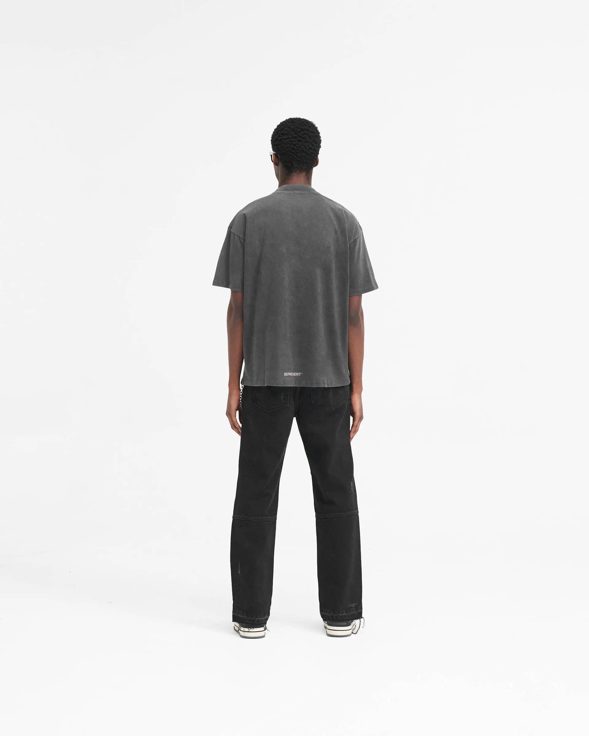 Off Black R2 Stepped Hem Denim: Modernized Classic Jeans for a Contemporary Look