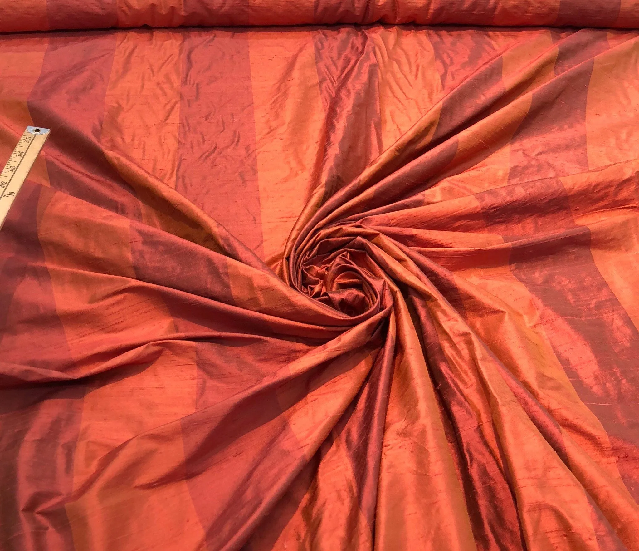 Silk shantung stripe 54&quot; wide    Beautiful burnt orange color stripe silk shantung fabric sold by the yard
