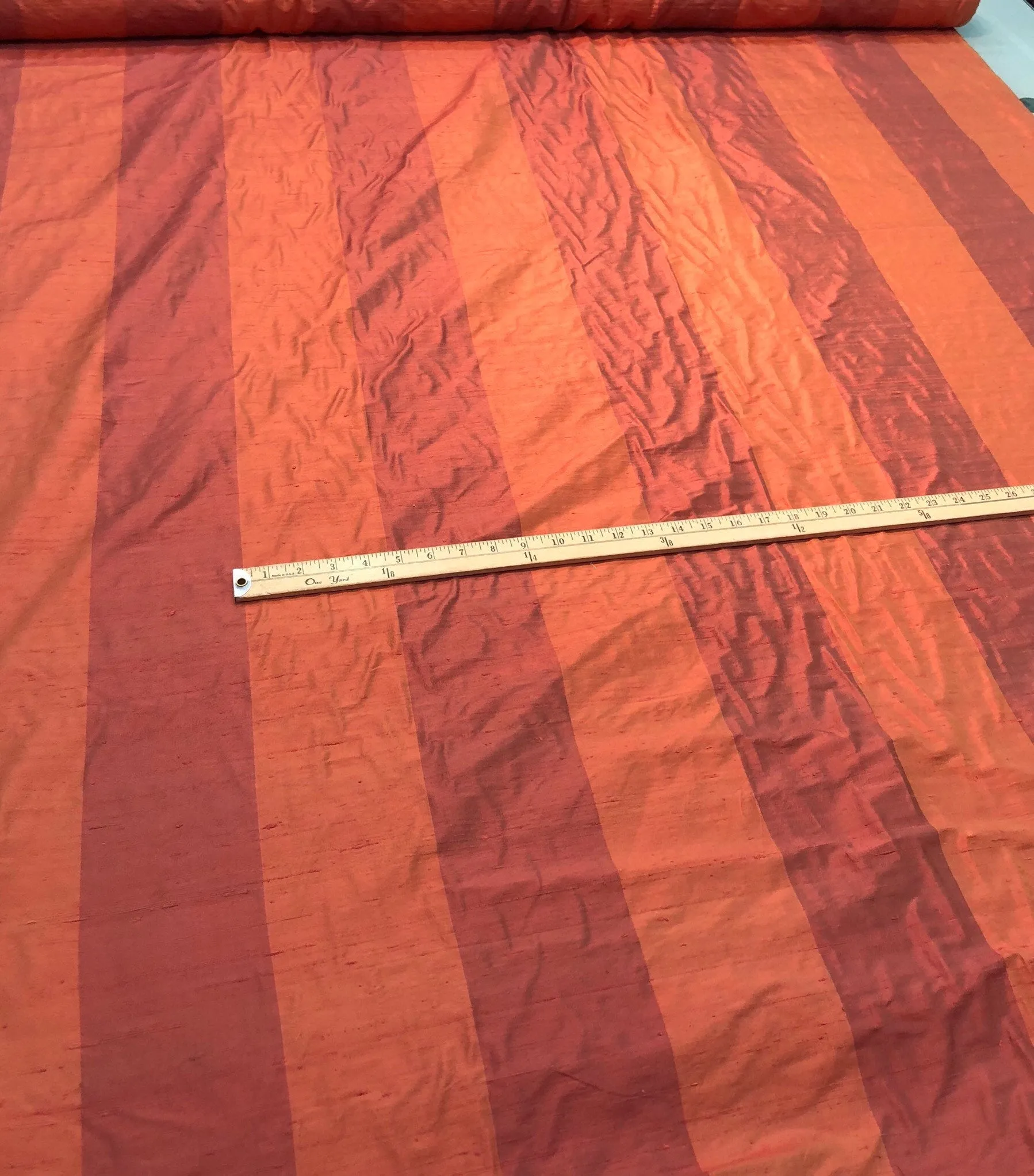 Silk shantung stripe 54&quot; wide    Beautiful burnt orange color stripe silk shantung fabric sold by the yard